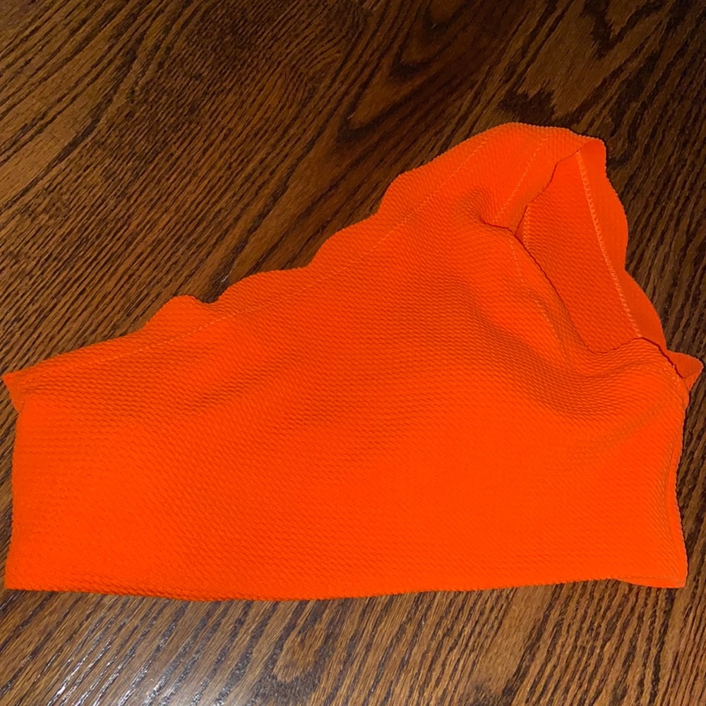 Bright orange bathing suit top
